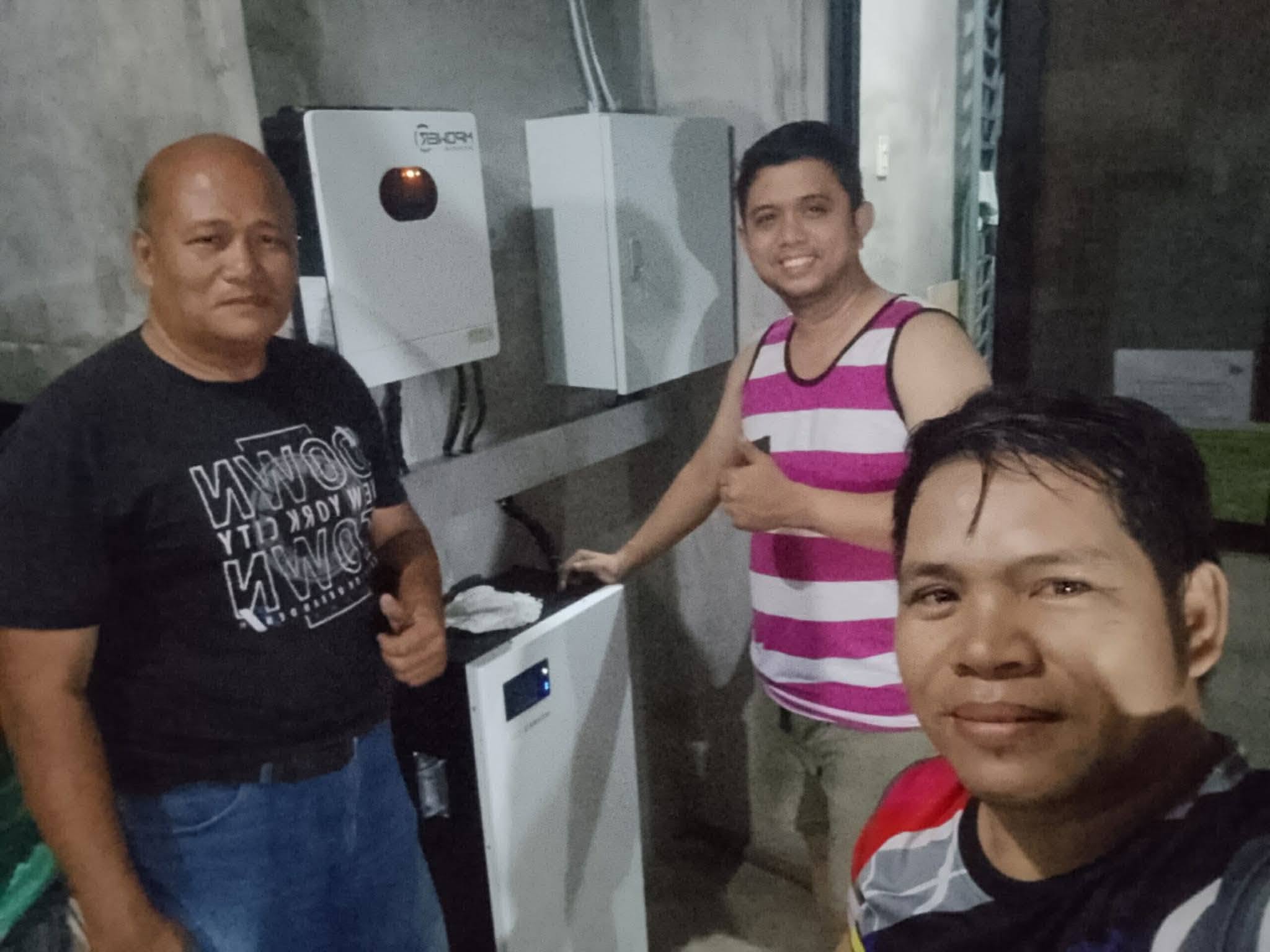 Ardyuron Solar team with client at a completed home energy storage installation